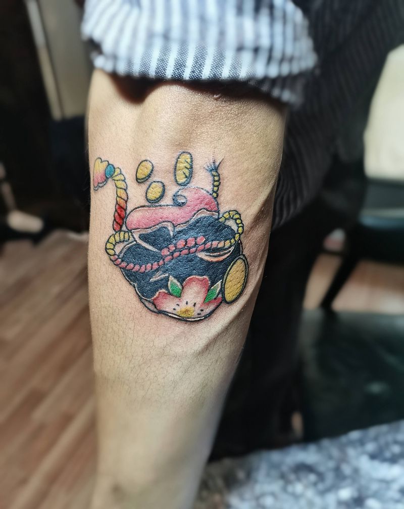 钱袋纹身图片_手臂纹身图案