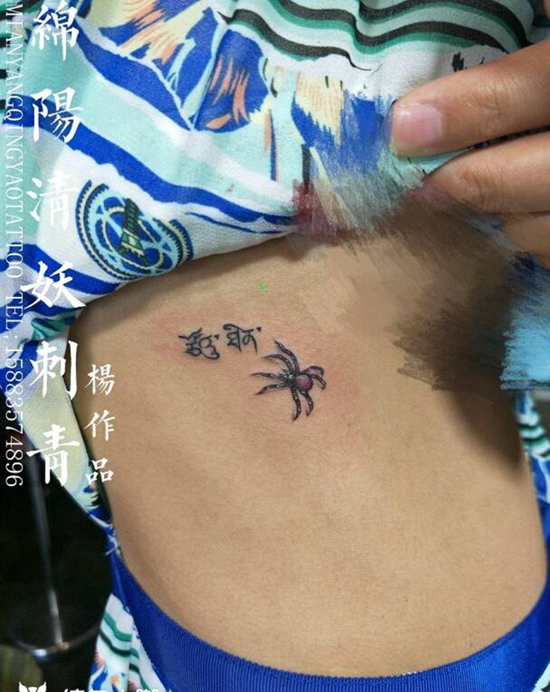腰部蜘蛛 藏文纹身，蜘蛛寓意着纹身图片_肩部腰部背部手部欧美传统习俗肖像纹身图案