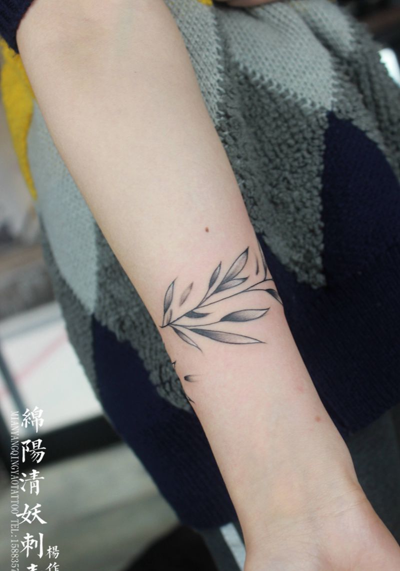 树叶纹身图片_手臂纹身图案