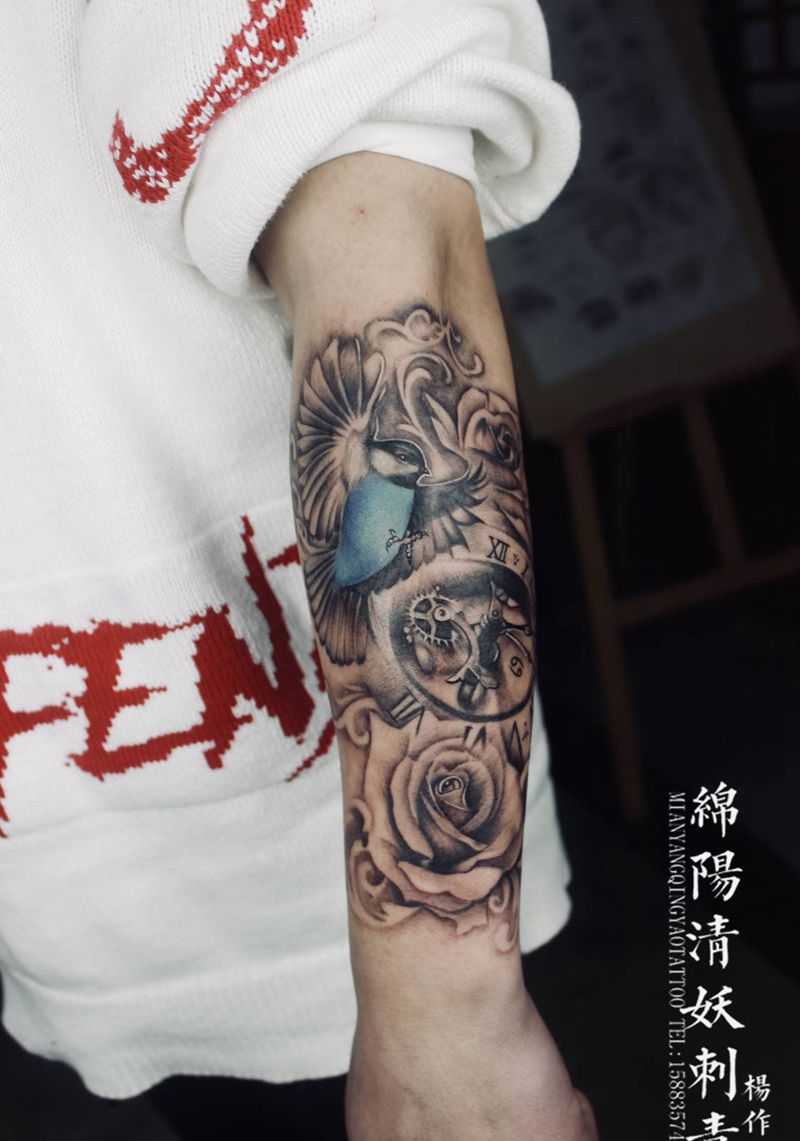 小臂时钟花纹身图片_手臂纹身图案
