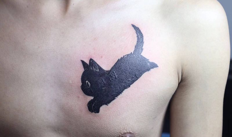 黑猫遮盖纹身图片_胸部纹身图案