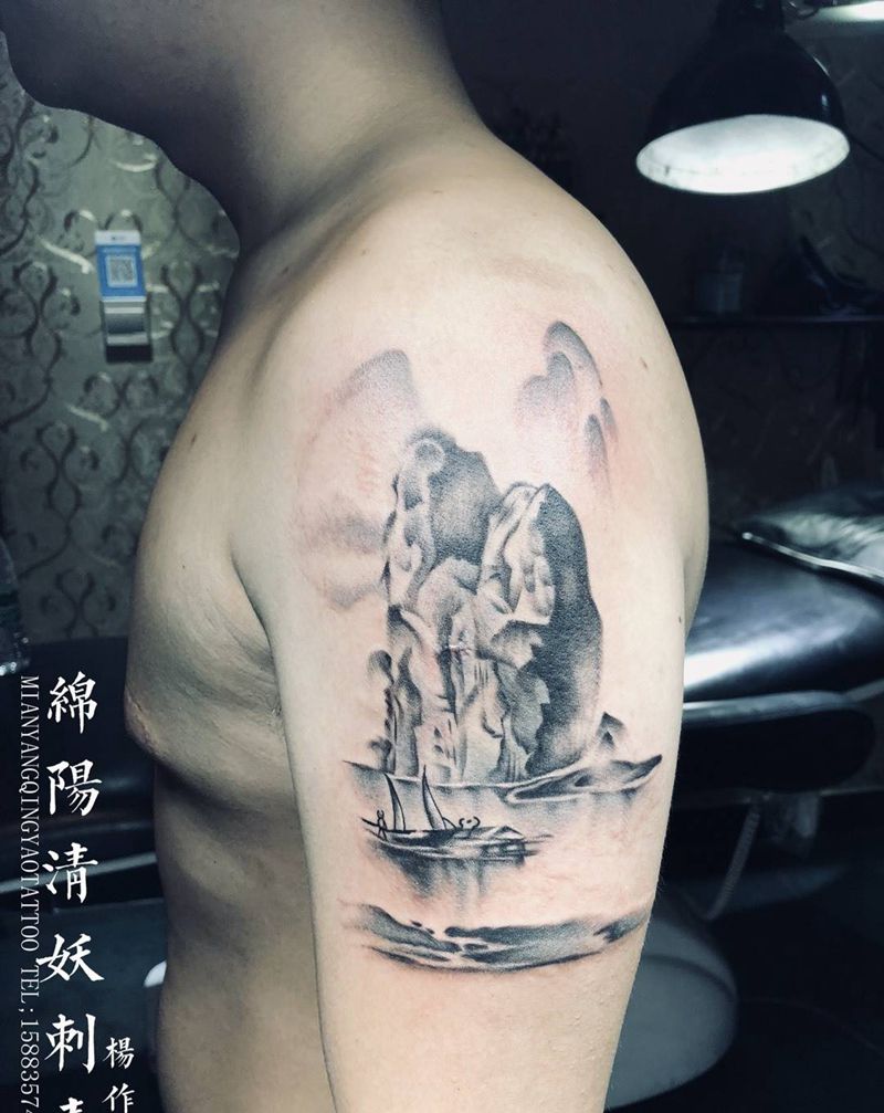 手臂外侧山水纹身 杨作品纹身图片