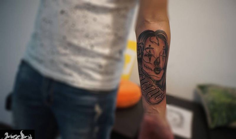 奇卡诺亡灵女郎纹身图片_欧美写实宗教情侣手臂纹身图案