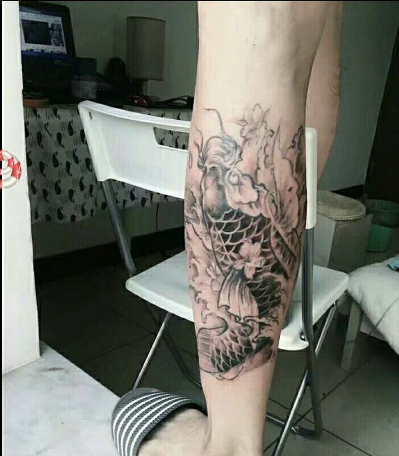 鱼摆摆纹身图片