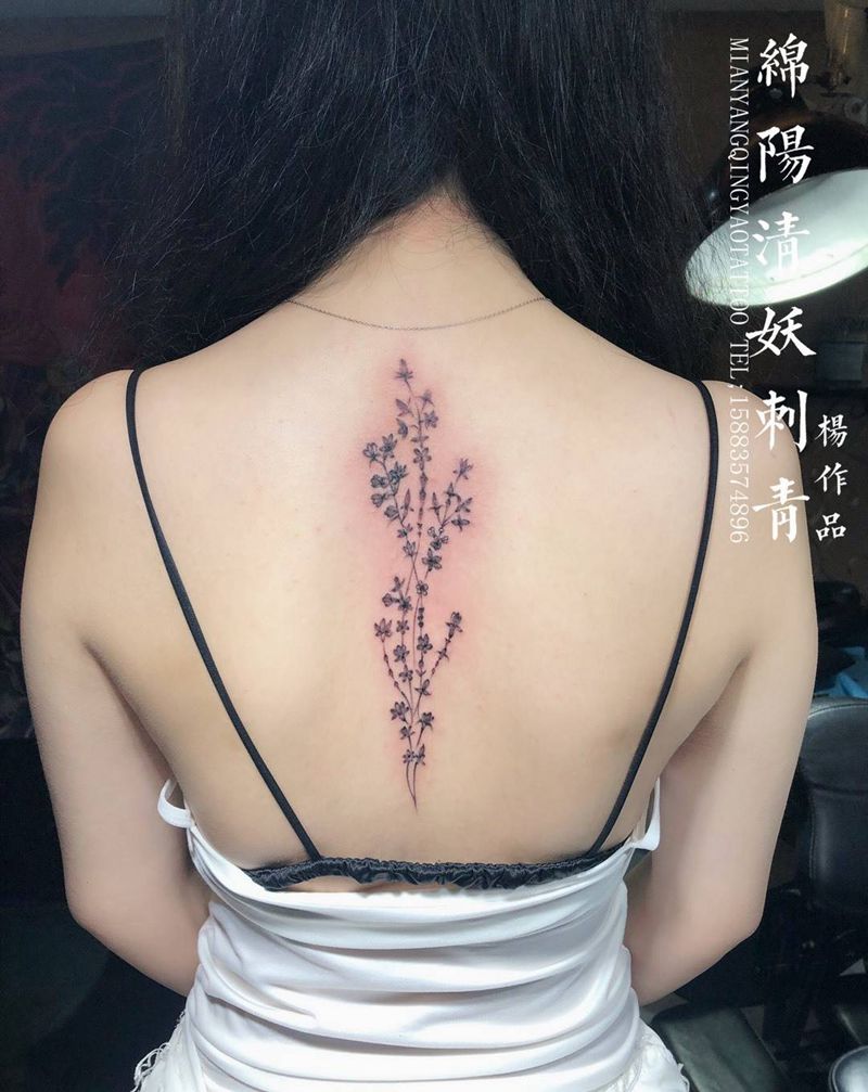 后背花纹身图片