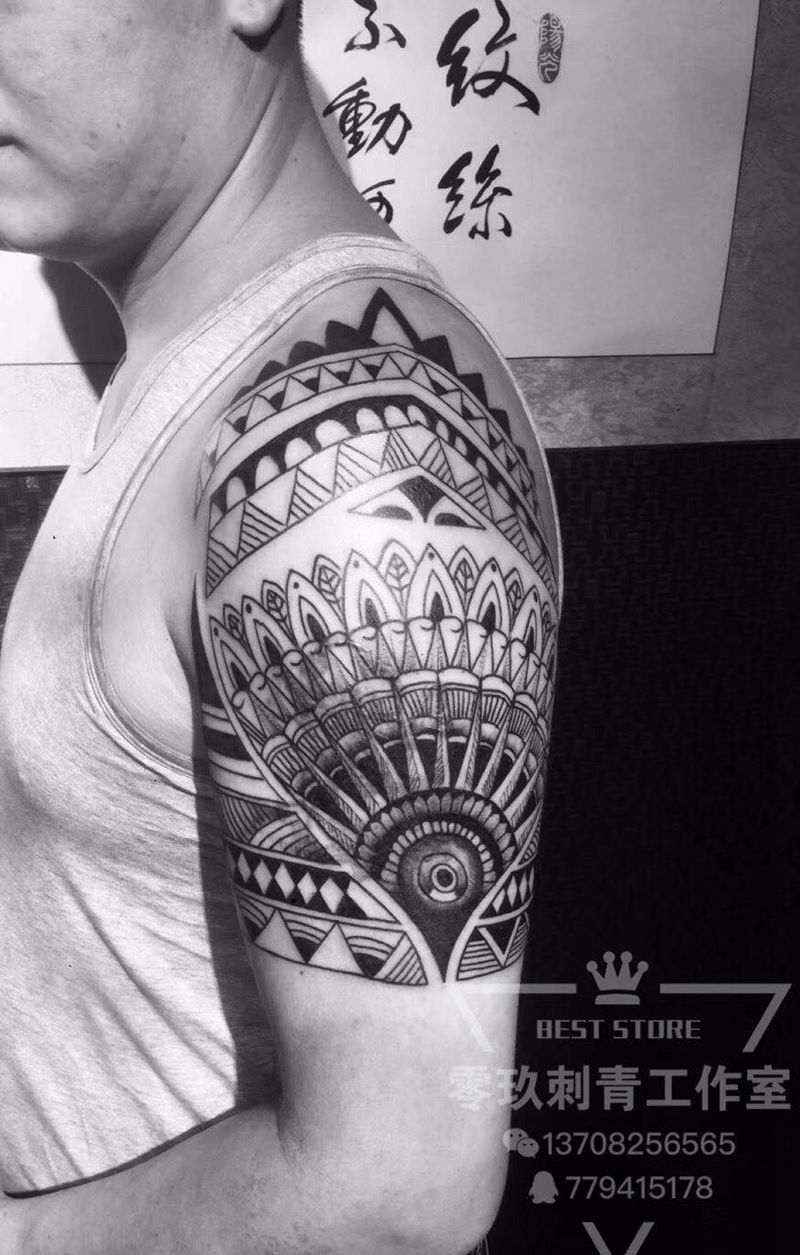 大臂图腾遮盖纹身图片_手臂图腾纹身图案