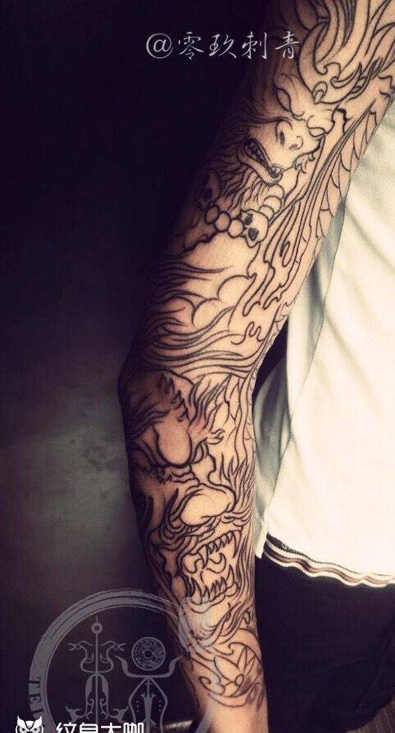 大圣擒龙勾线完成纹身图片