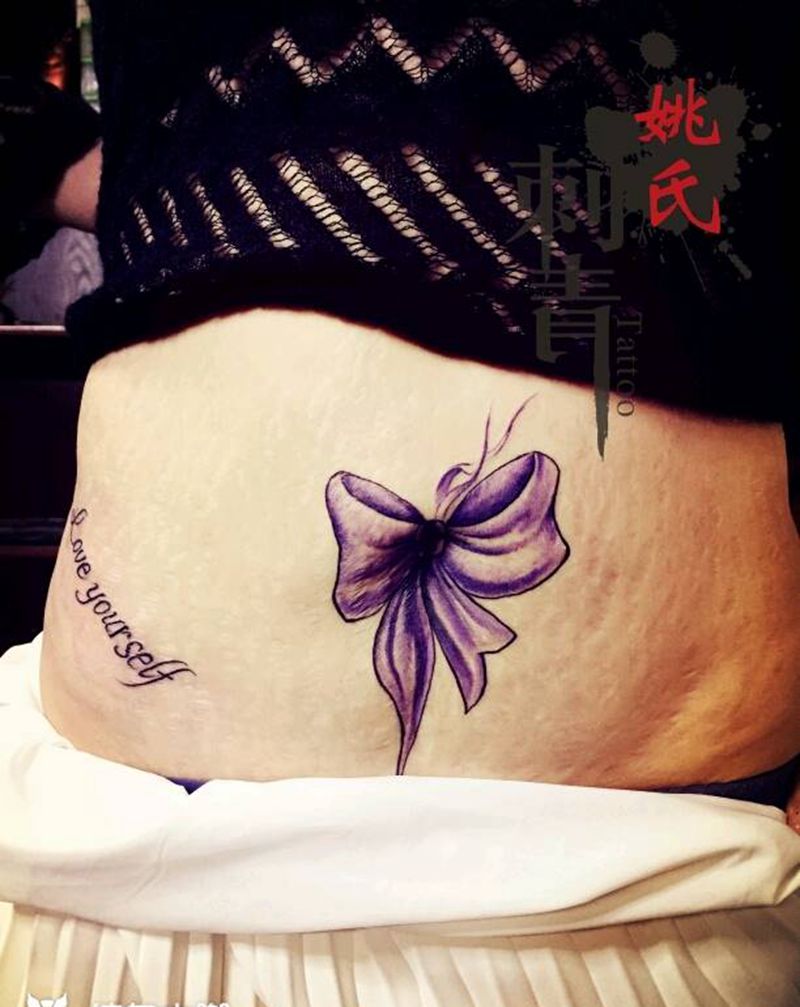 遮盖妊辰纹纹身图片