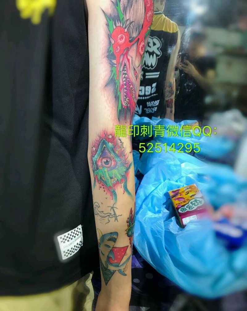 拼接小花臂纹身图片