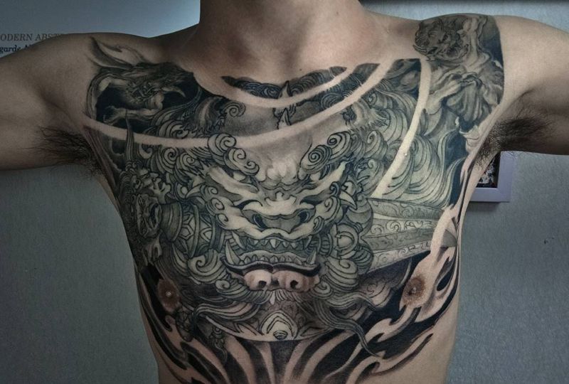 唐狮纹身图片_胸部新传统唐狮纹身图案