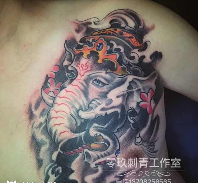 胸口象神遮盖纹身图片