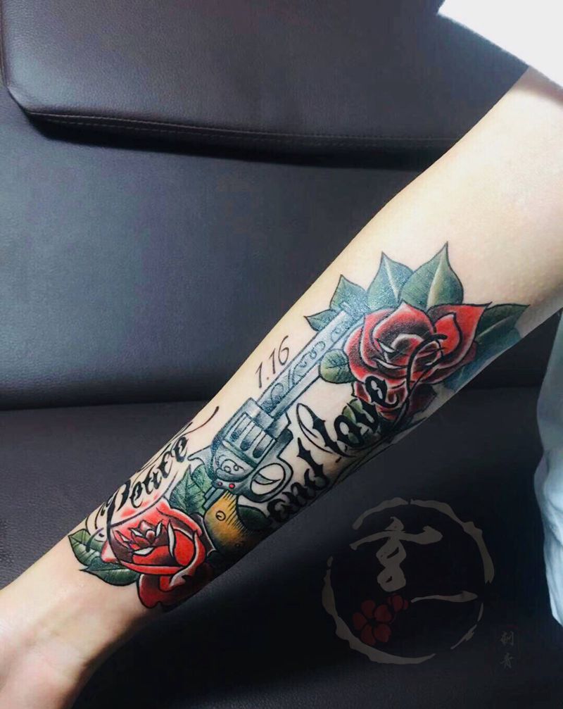 枪花纹身图片