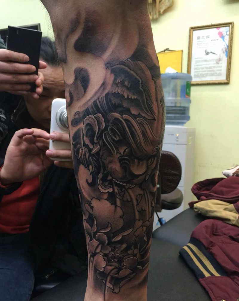 观音福狮纹身图片
