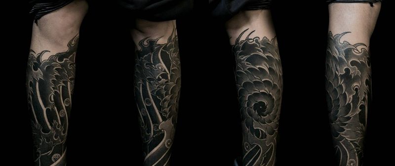 老传统浪纹身图片_腿部老传统纹身图案