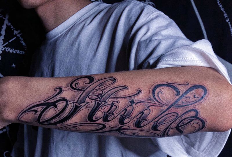 花体字纹身图片_手臂纹身图案