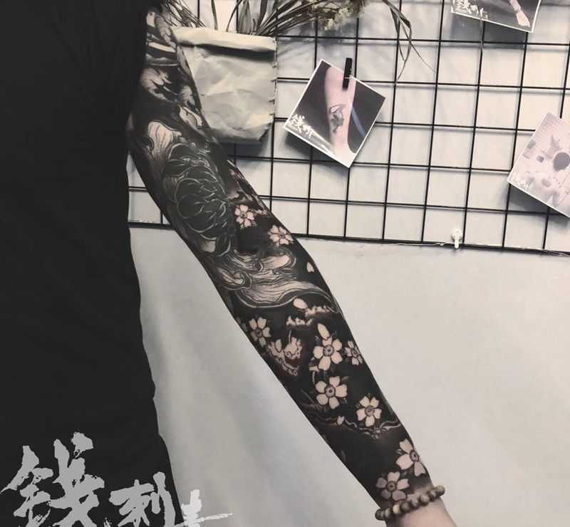 黑臂儿纹身图片