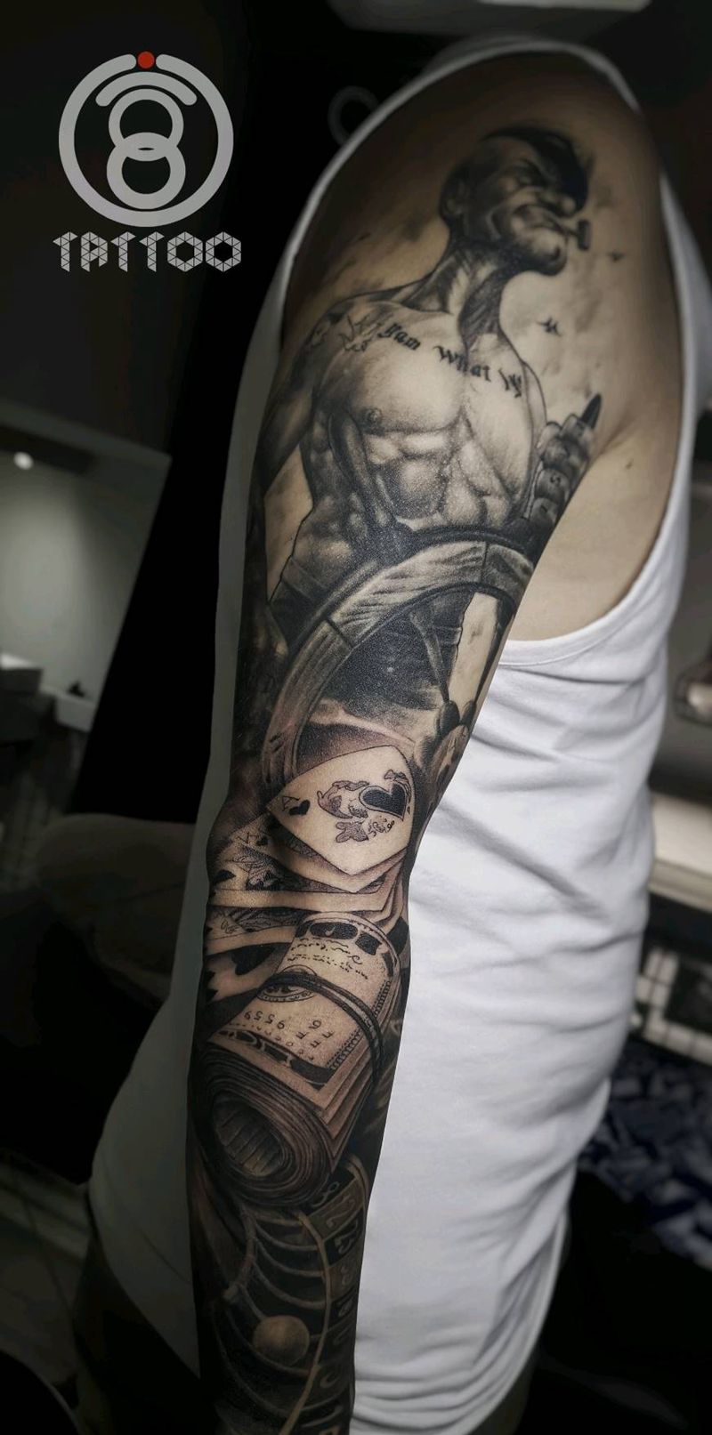 欧美花臂拼接纹身图片_手臂欧美写实纹身图案