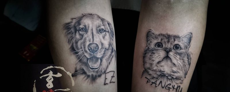 小猫小狗一组纹身图片_手部欧美写实纹身图案