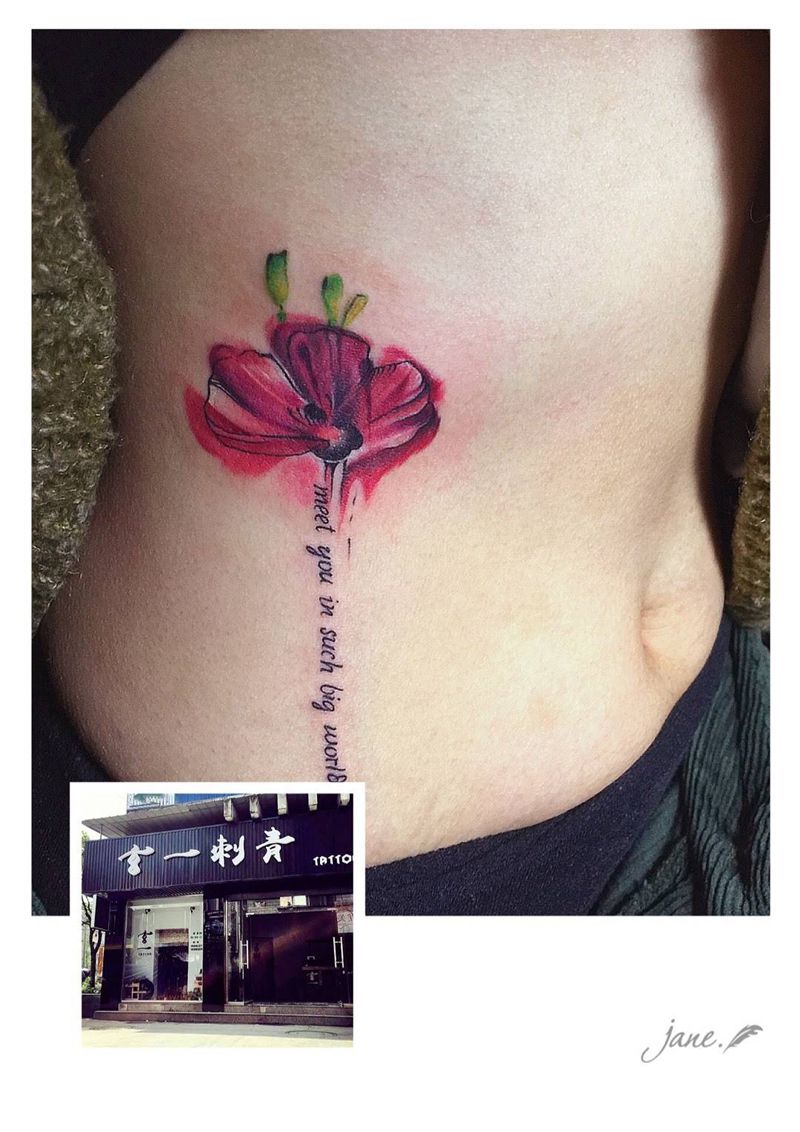 泼墨小花一枚纹身图片