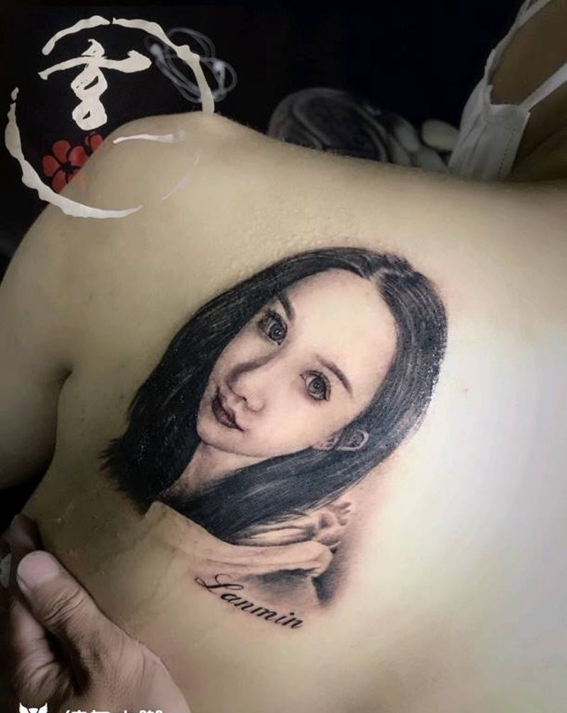 肖像一枚纹身图片_背部欧美写实纹身图案