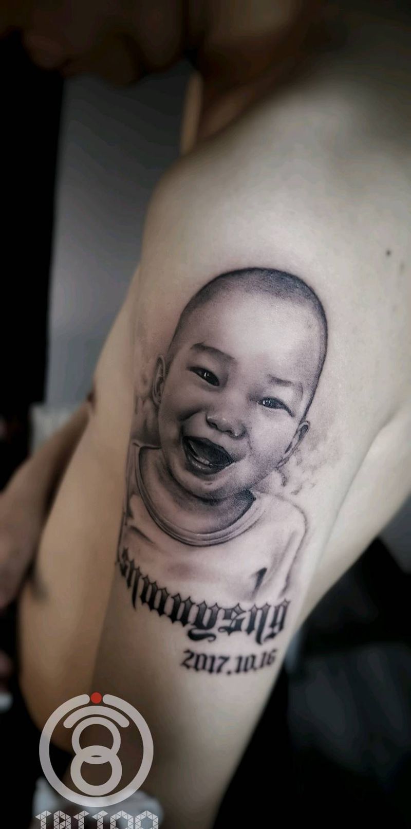 肖像一枚纹身图片_手臂欧美写实纹身图案