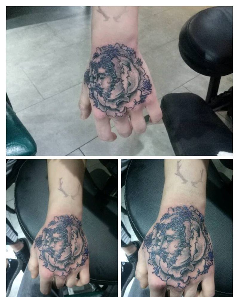 手背莲花纹身图片