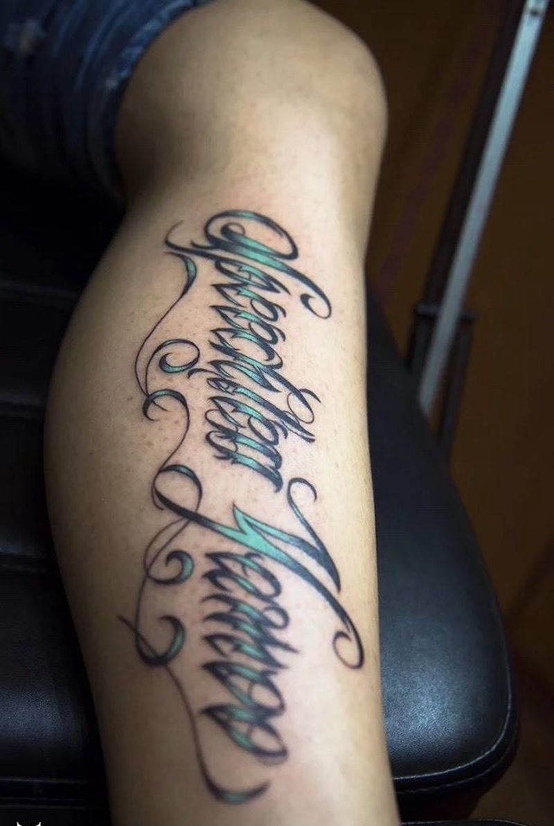 花体纹身图片_腿部字符成品纹身图案