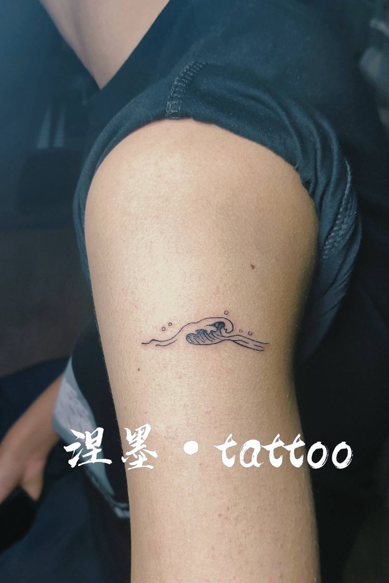 海浪纹身图片_手臂纹身图案