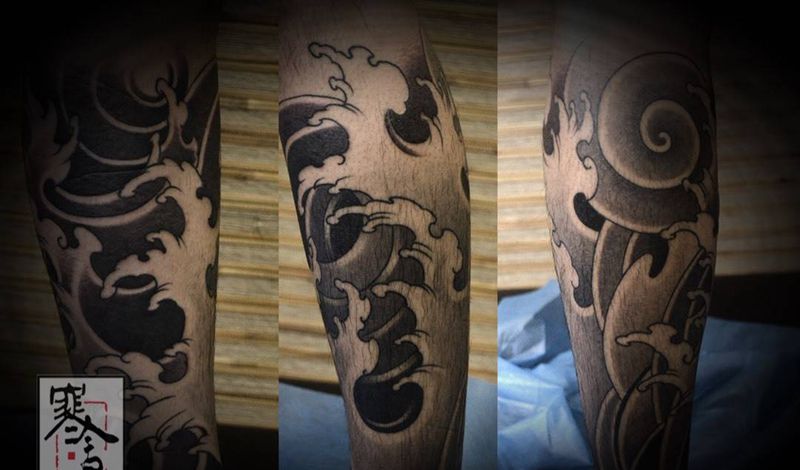 浪纹身图片_成品腿部传统纹身图案