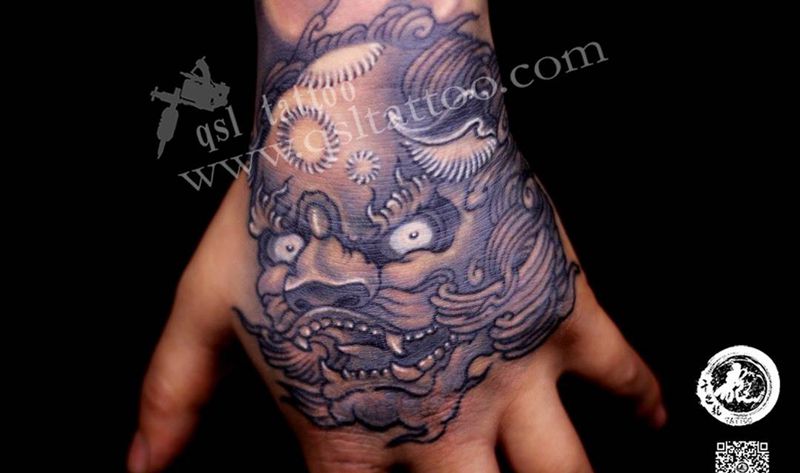 手臂 唐狮子纹身图片