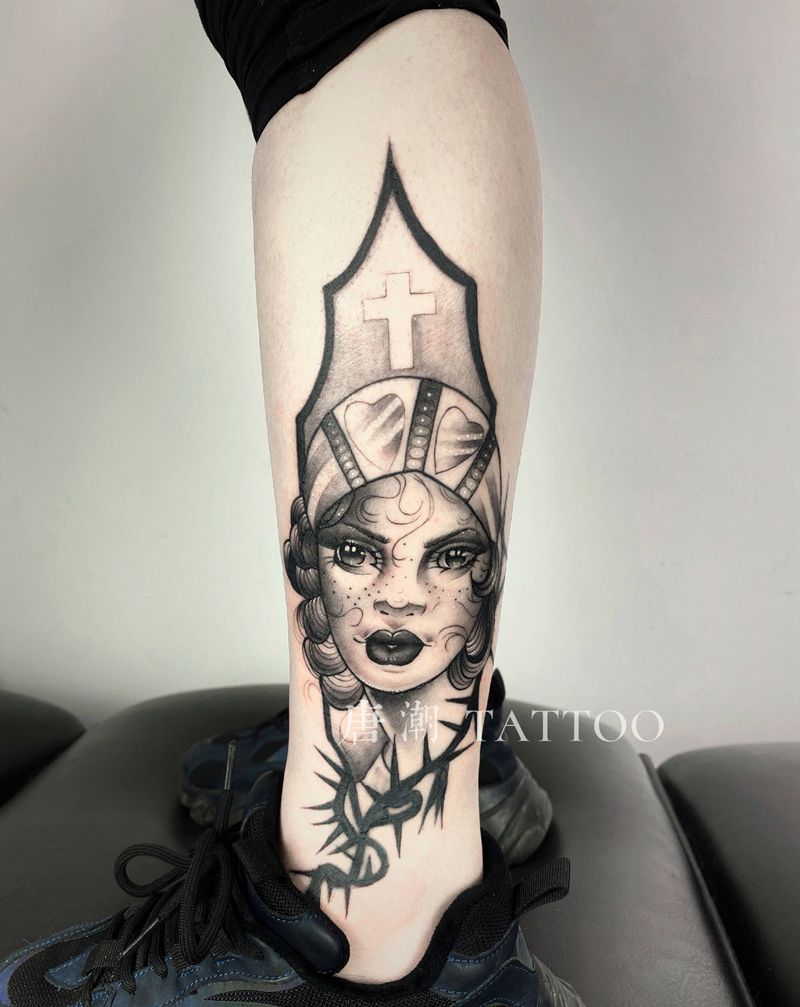 荆棘女修士纹身图片_腿部Old School纹身图案
