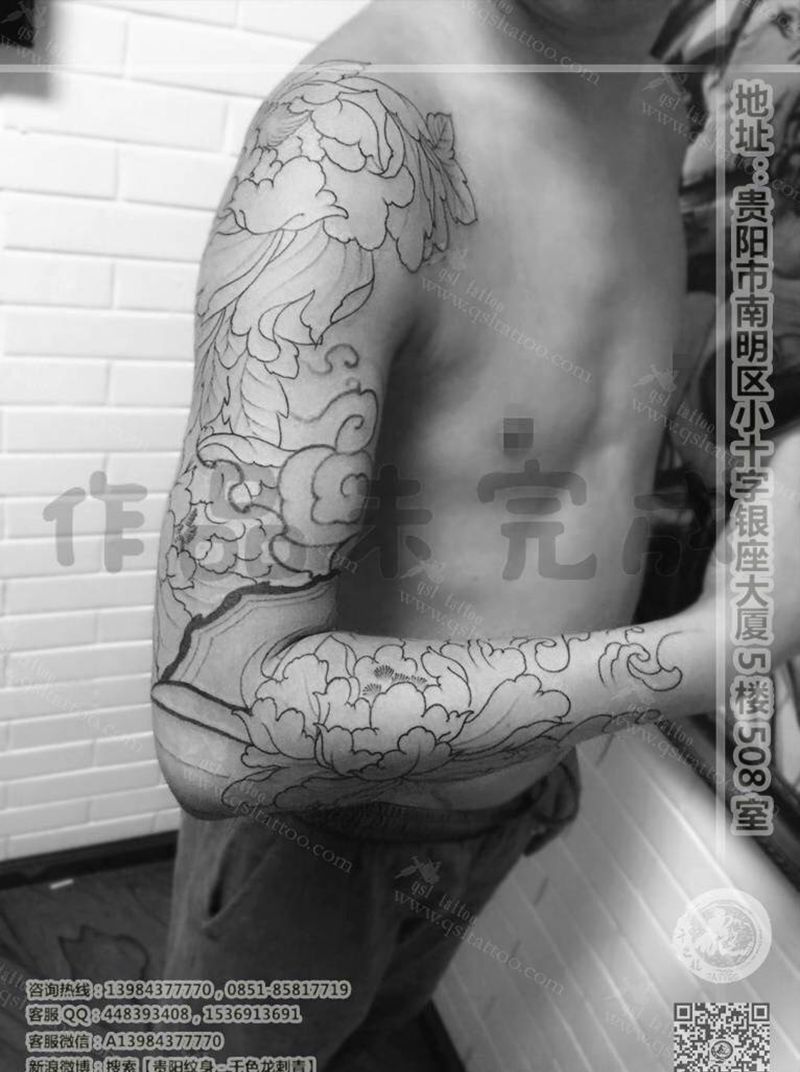 未完成牡丹花臂纹身图片