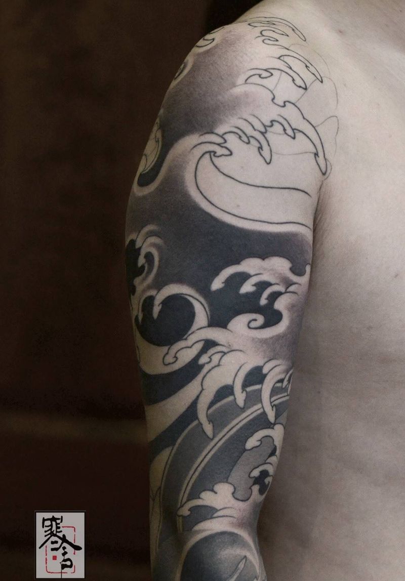 海浪未完纹身图片_手臂新传统纹身图案