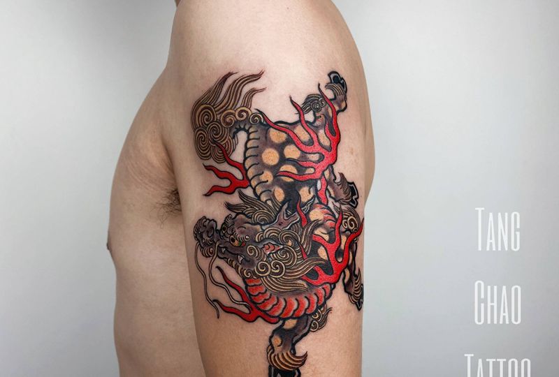 传统麒麟纹身图片_手臂老传统纹身图案