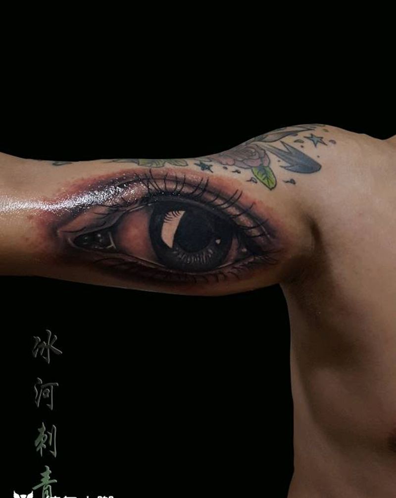 眼睛纹身图片_手臂写实成品纹身图案