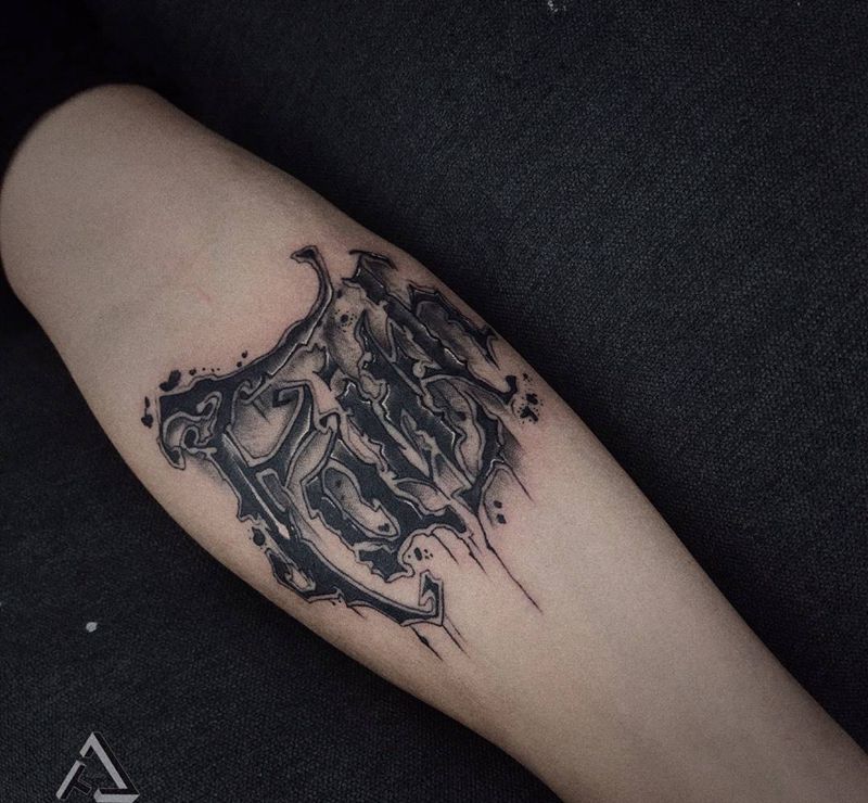 信仰纹身图片_手臂花体字纹身图案