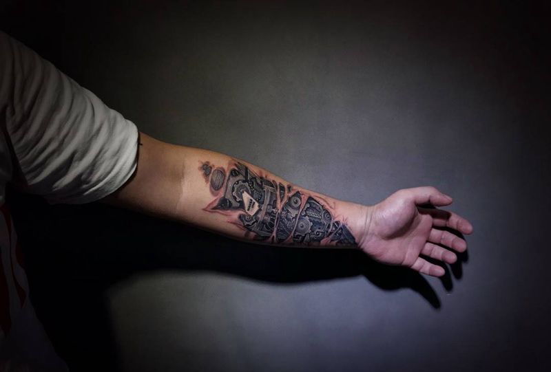 【铁男】机械⚙️臂纹身图片_手臂欧美写实纹身图案