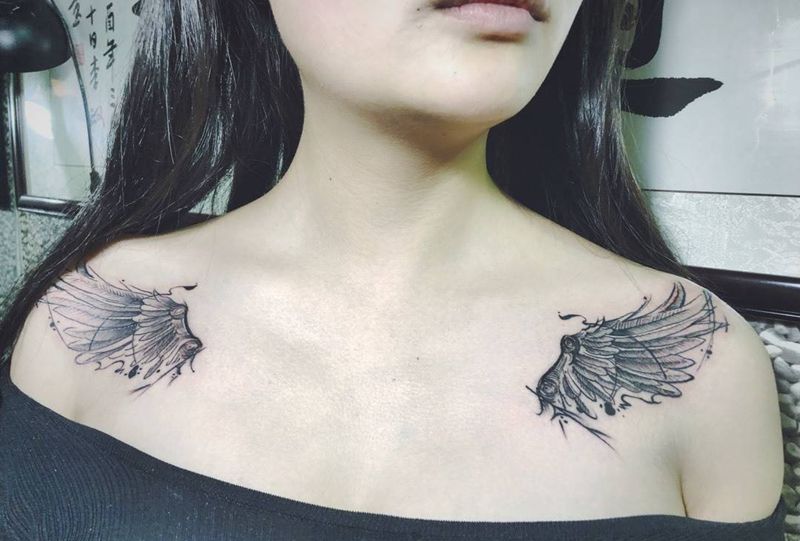 几何翅膀纹身图片