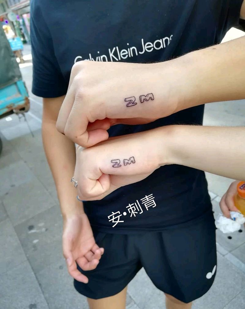 小情侣字母纹身图片