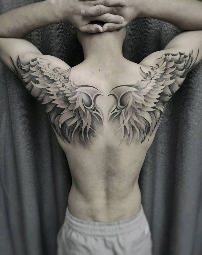 翅膀遮盖……纹身图片_背部纹身图案