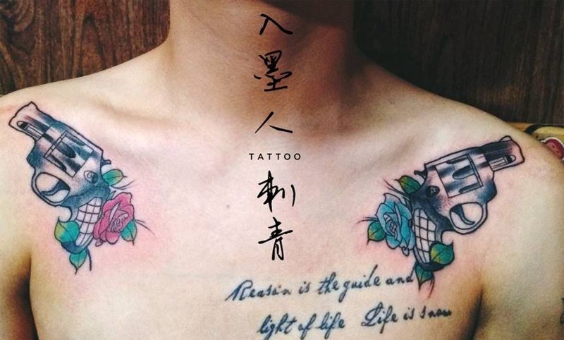 枪花纹身图片