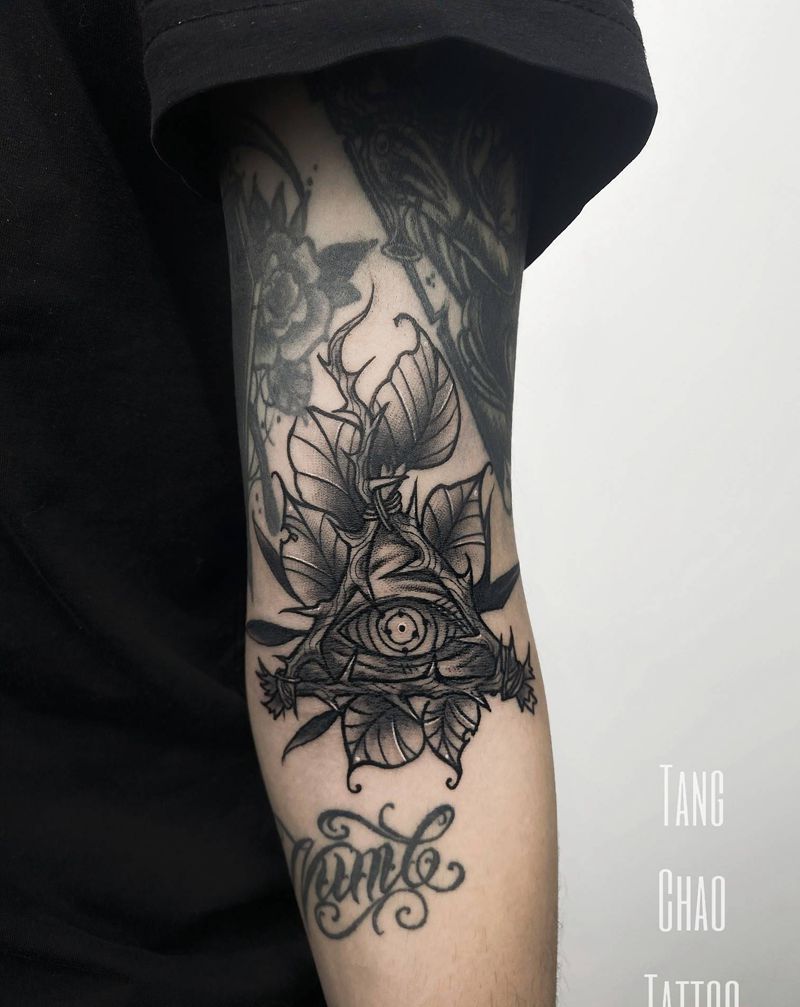 写轮眼纹身图片_手臂欧美写实纹身图案