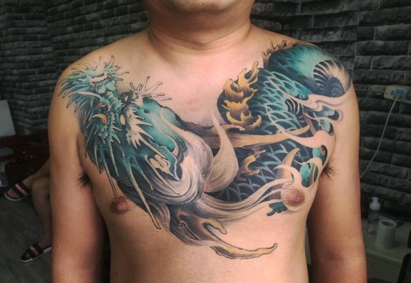 恢复一个月纹身图片_胸部纹身图案