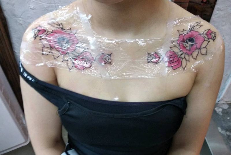 玫瑰未完纹身图片