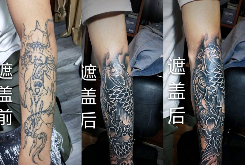 鲤鱼遮盖纹身图片_手部新传统纹身图案