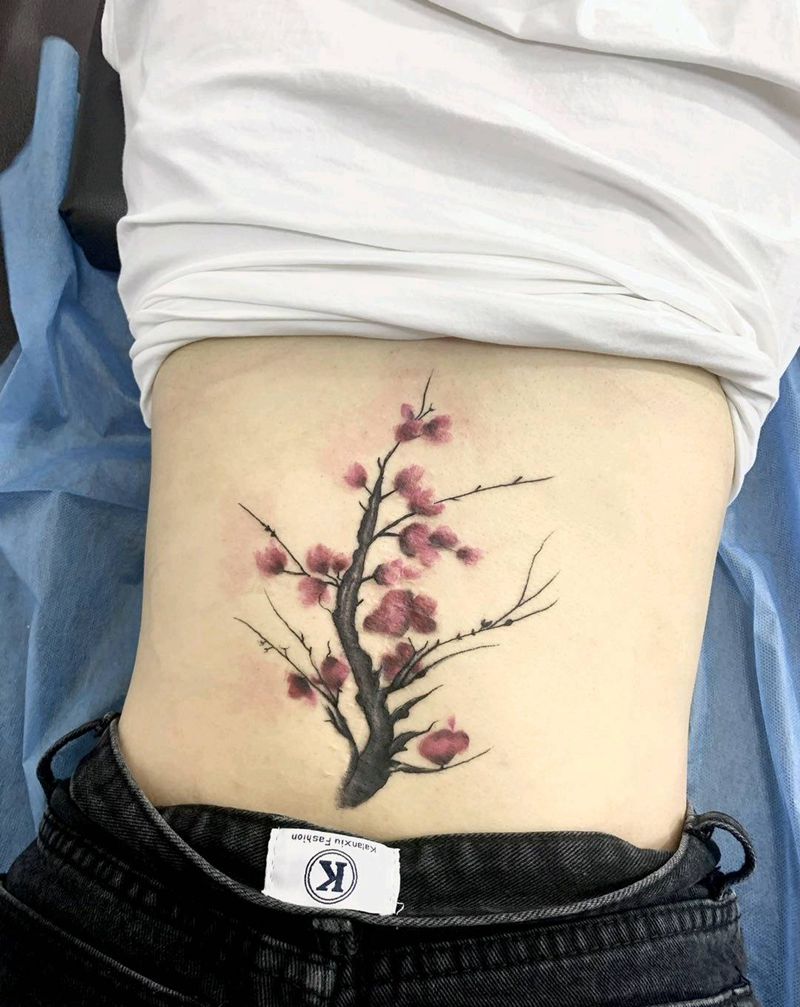梅花三弄纹身图片_腰部植物纹身图案