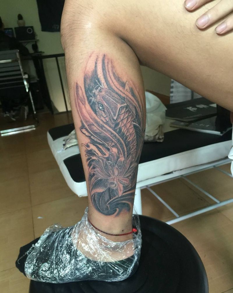 鱼纹身图片_腿部传统动物纹身图案