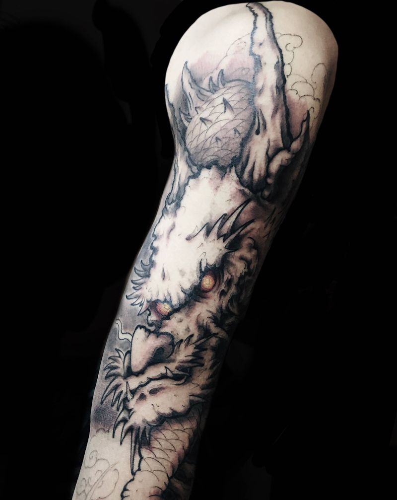 龙花臂未完纹身图片_手臂新传统纹身图案