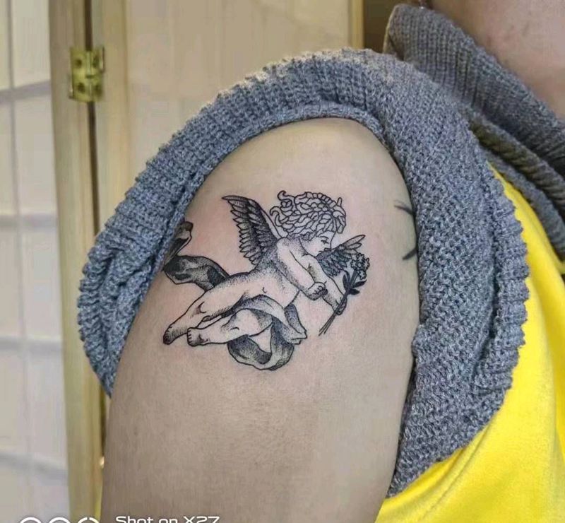 丘比特纹身图片_手臂纹身图案