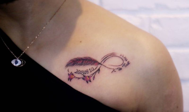 羽毛英文字母纹身图片